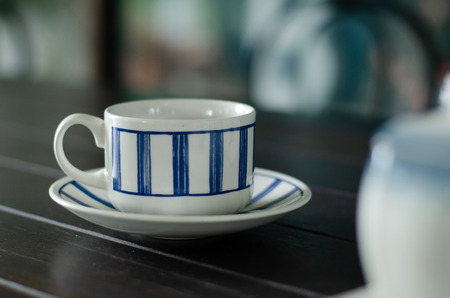 High quality ceramic coffee cup with cup matの写真素材