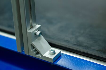 Aluminum frame fixed to the corner with hex screwsの写真素材