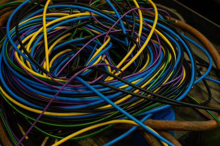 Many kinds of wires coiled into a pile