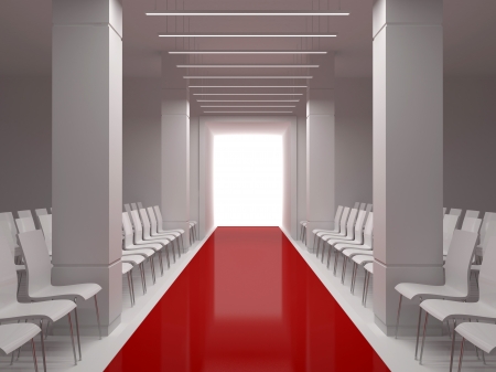 Hall with a podium, columns and red carpetの写真素材