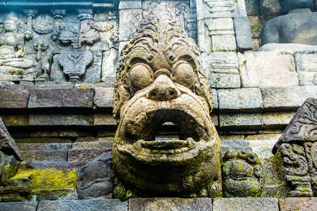 Old ancient wall of Buddhist temple complex Borobudur, Yogyakarta, Jawa in Indonesiaの写真素材