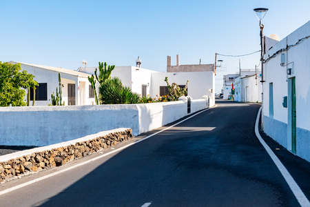 Typical white architecure of the Ye village under volcano Monte Corona, Lanzarote, Canary Islands, Spain.の写真素材