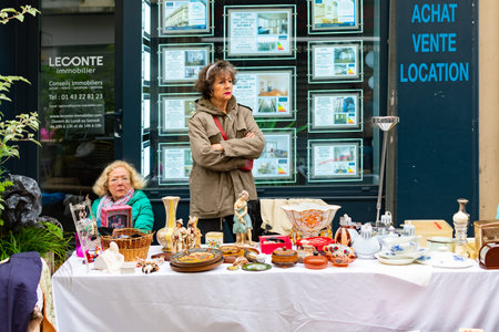 Paris, France, 20 May 2019 - Unidentified people at the traditional flea market  in the morning,...