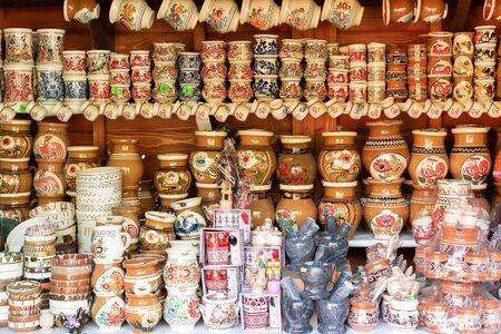 Bucovina, Romania, 15 September 2019 - Romanian souvenirs. Traditional clothing and accessories inside Romanian showroom souvenir shop in Bucovina regionのeditorial素材