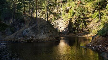 Autumn landscape witch golden water (in Colourful lakelets, Sudetes, Landeshut Ridge)の写真素材