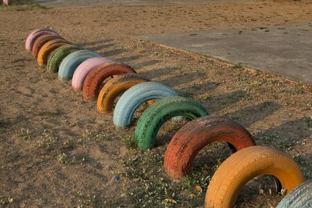 Children's toys made from old car tires in Thailandの写真素材