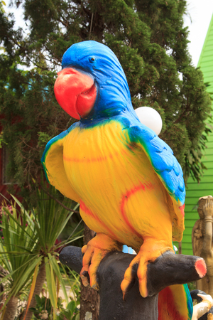 Colorful parrot statue in public park,Thailandの写真素材