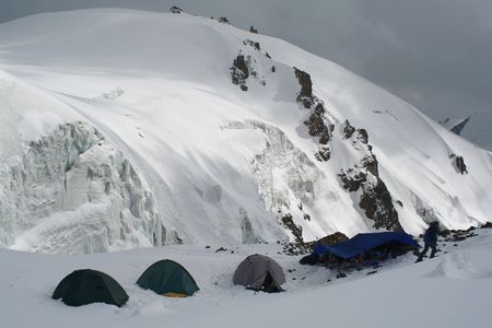 hikers camp in high mountainsの写真素材
