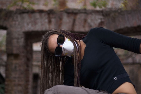 Girl with glasses and respiratorの写真素材