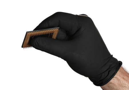 black gloves holding semiconductorの写真素材