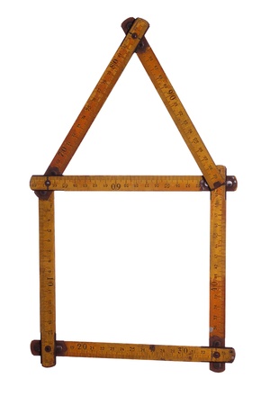 symbol of house made of old yardstickの写真素材