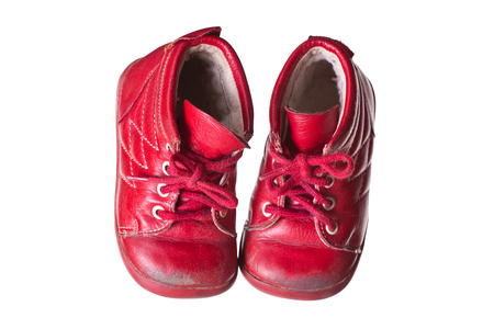 old red used baby shoesの写真素材