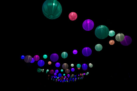 Brightly colored lanterns at night