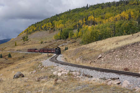 Chama, New Mexico, USA September 28, 2021: Cumbres and Toltec Scenic Railroad winding along the tracksのeditorial素材