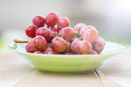 a dish of freshness  grapes from farm .の写真素材