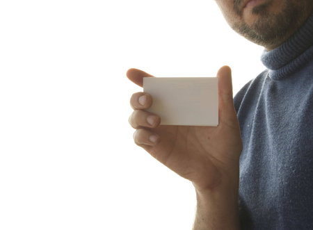 Businessman handing a card