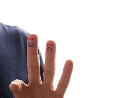 finger and another sad smileの写真素材