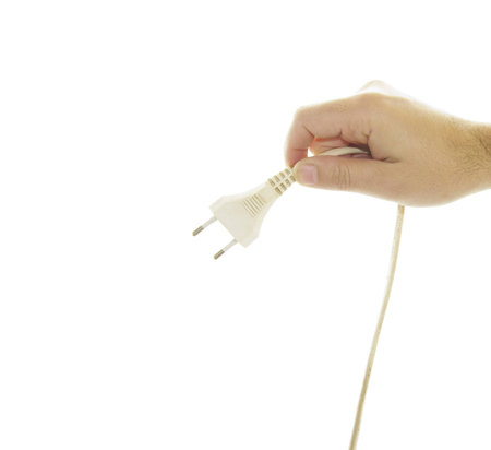 hand of man showing a plug with a white background