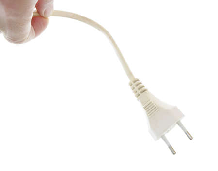 hand of man showing a plug with a white backgroundの写真素材