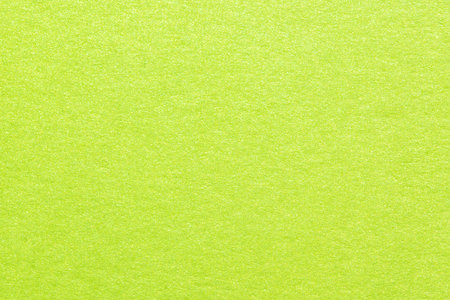 Texture of green shiny metallic paper