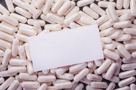 Medcine white pills on black background Mock-upの写真素材