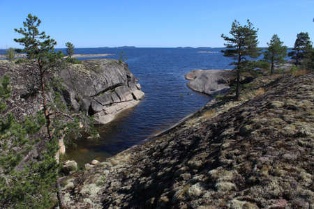 Stony shore of Ladoga lake, Russia, Kareliaの写真素材