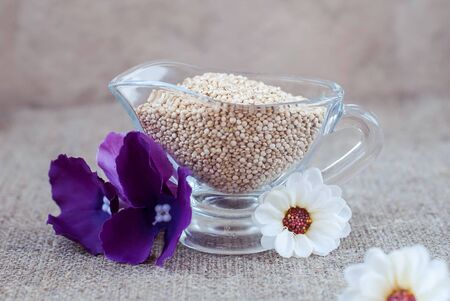 Krupa kinoa in glassware on a linen tableclothの写真素材