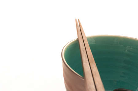 Closeup of One Bowl with Chopsticksの写真素材