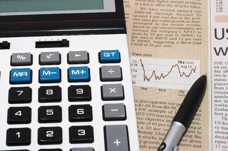 Stock chart analysis, calculator, with pen, horizontal orientation. charts, analysis, ups and downsの写真素材