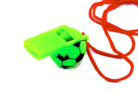 Green Soccer Ball whistle with red stringの写真素材