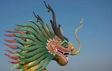 Dragon head sculpture on the temple stairsの写真素材