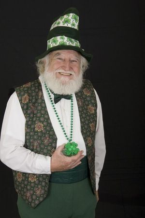 an old man dressed as a Leprechaunの写真素材