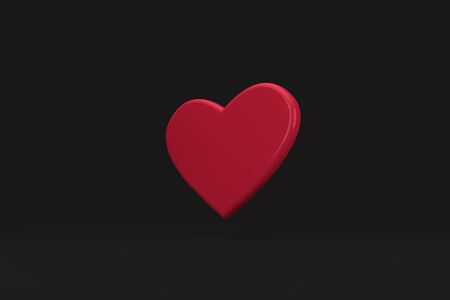 3d Floating heart on black backgroundの写真素材
