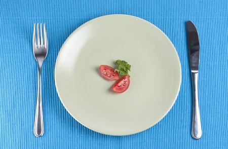 Minimalist image of vegetables on a plateの写真素材