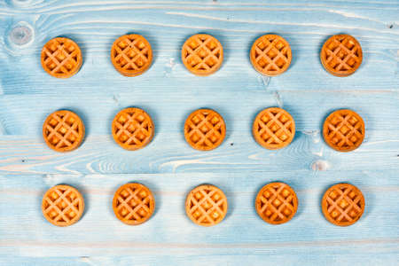Wafer biscuits on a wood background.の写真素材