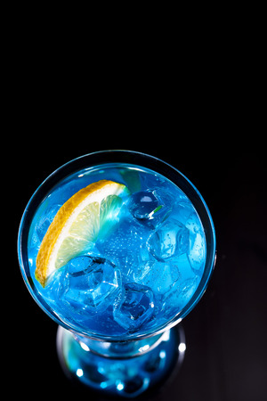Blue cocktail on a black backgroundの写真素材