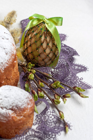 Easter egg cakes decorated with tree branches with young buds