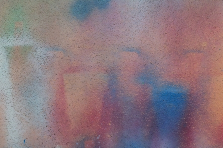 Spray paint on orange wall.の写真素材