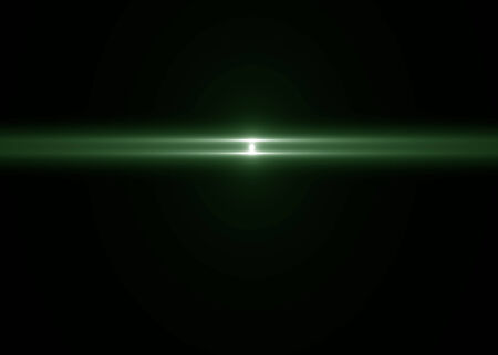 Green light on black backgroundの写真素材