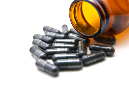 medicine capsule on white background. focus center of capsuleの写真素材