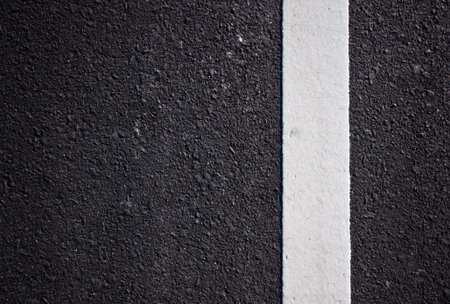 Asphalt road with separation white lines