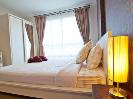 Beautiful bedroom interior and towelsのeditorial素材
