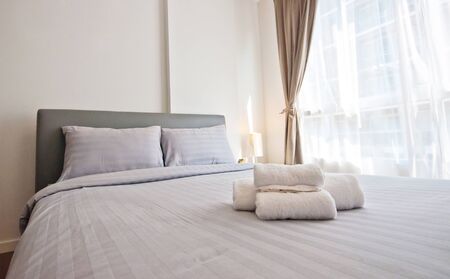 Beautiful bedroom interior and towelsのeditorial素材