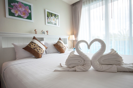 Beautiful bedroom interior and towelsのeditorial素材