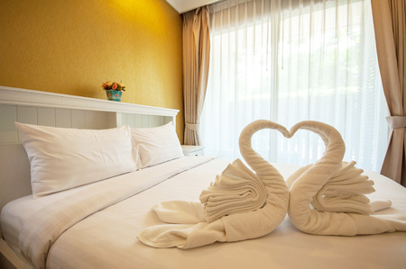 Beautiful bedroom interior and towelsのeditorial素材