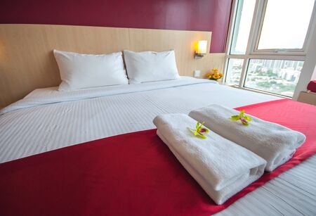 Beautiful bedroom interior and towelsのeditorial素材