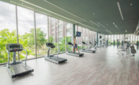 Abstract blur gym and fitness room interior for background