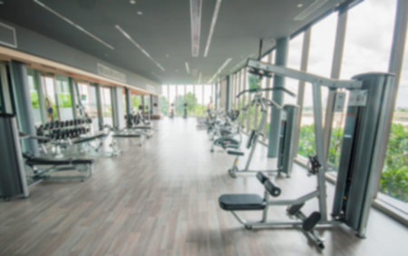Abstract blur gym and fitness room interior for background