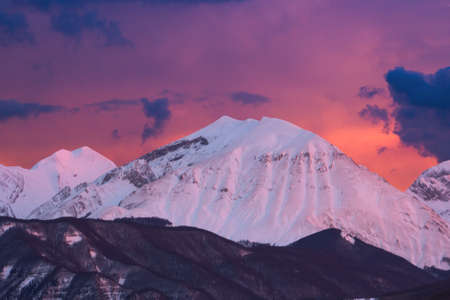 View of winter fiery sunset over Monte Corvo in the Gran Sasso e Monti della Laga National Park Abruzzoの写真素材