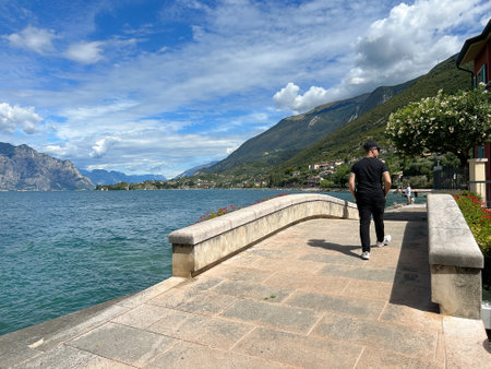 Walkway near the Garda lake in Malcesine during summer season, Venetoの写真素材